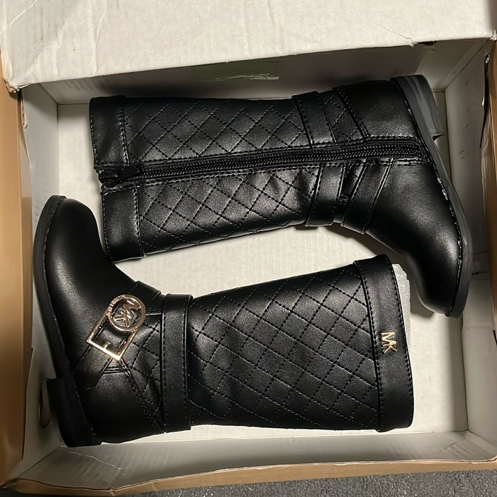 Never worn MK boots! Box is rough, but the boots are in perfect condition!